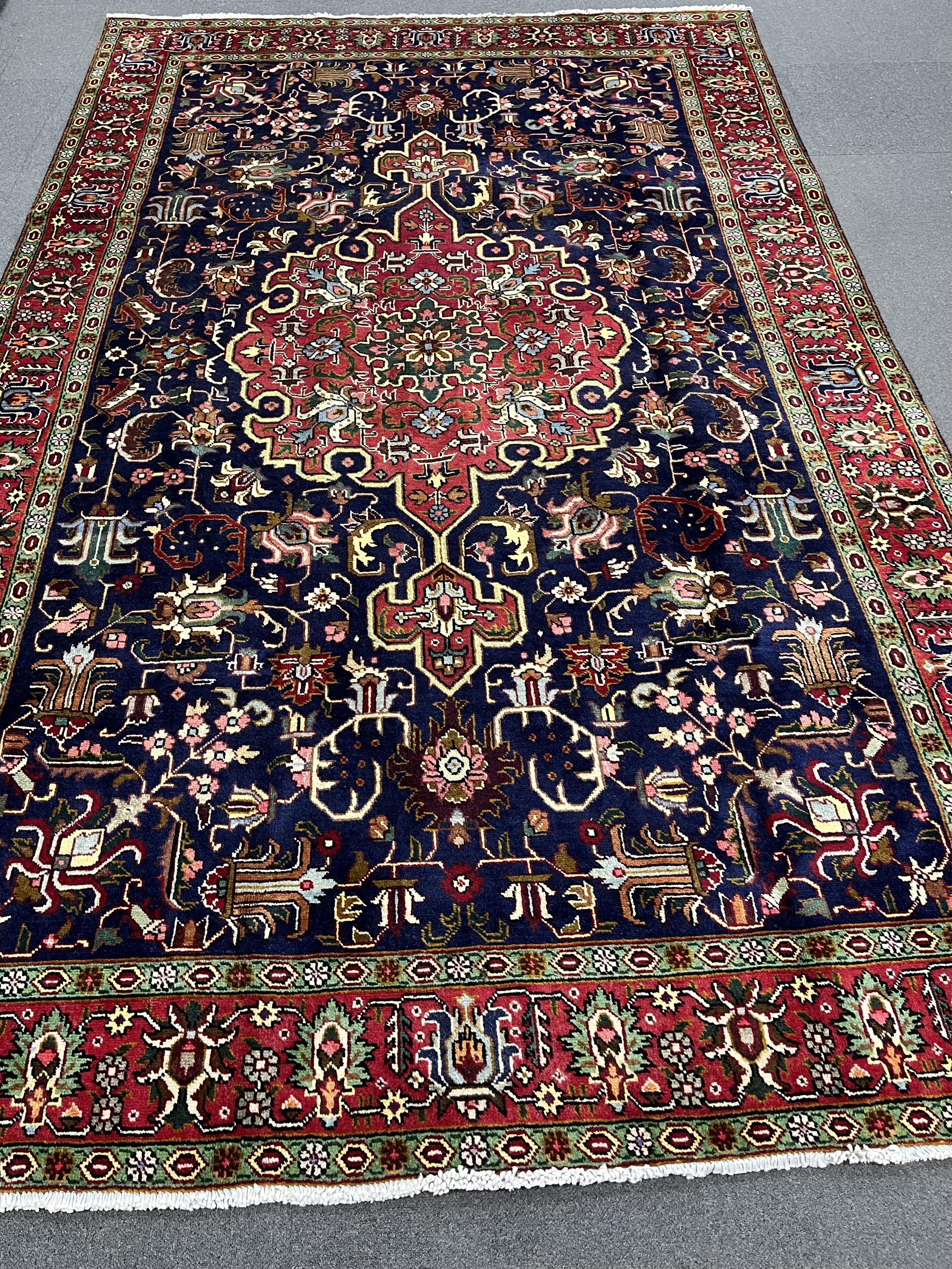 A Tabriz blue ground carpet, 320 x 196cm. Condition - good